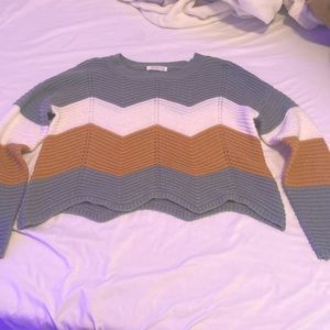 Green, white, and orange sweater. A large in Womens